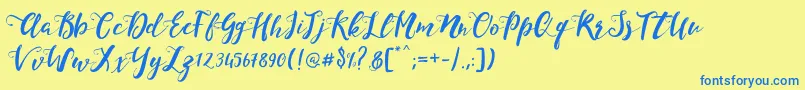 Шрифт MonicaScript – синие шрифты на жёлтом фоне