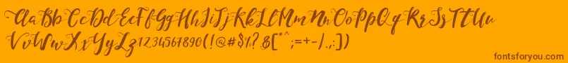 Шрифт MonicaScript – коричневые шрифты на оранжевом фоне