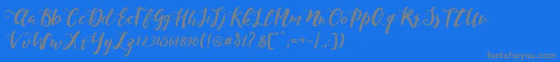 Weitere Informationen zur MonicaScript-Schriftart MonicaScript-Schriftart – Graue Schriften auf blauem Hintergrund