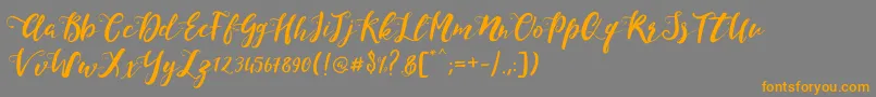 MonicaScript Font – Orange Fonts on Gray Background