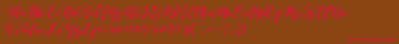 MonicaScript Font – Red Fonts on Brown Background