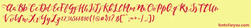 フォントMonicaScript – 赤い文字の黄色い背景