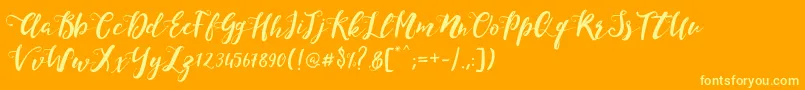 MonicaScript Font – Yellow Fonts on Orange Background