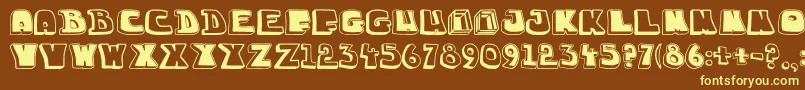 Chuckablock16-fontti – keltaiset fontit ruskealla taustalla