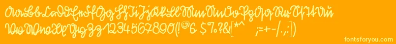 Kleinsfirstscript-Schriftart – Gelbe Schriften auf orangefarbenem Hintergrund