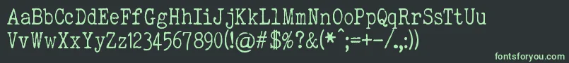 ElegantTypewriter-fontti – vihreät fontit mustalla taustalla