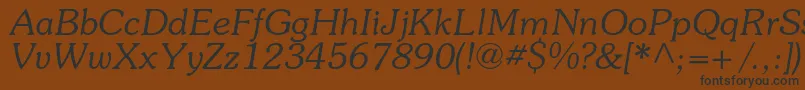 SouvenircItalic Font – Black Fonts on Brown Background