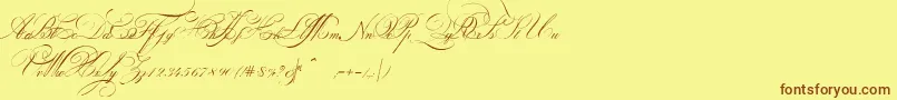 フォントIndentureenglishpenmanPersonalUseDemo – 茶色の文字が黄色の背景にあります。