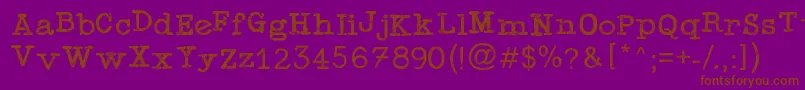 Saiba mais sobre a fonte TypewriterPress Fonte TypewriterPress – fontes marrons em um fundo roxo