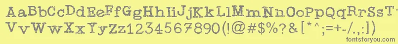 Подробнее о шрифте TypewriterPress Шрифт TypewriterPress – серые шрифты на жёлтом фоне