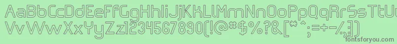 Omiczh-Schriftart – Graue Schriften auf grünem Hintergrund