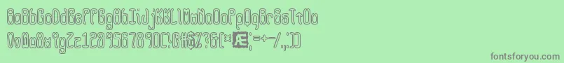 QueasyOutlineBrk Font – Gray Fonts on Green Background