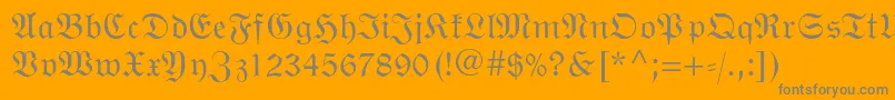 Wittenbergerfrakturmtstd-Schriftart – Graue Schriften auf orangefarbenem Hintergrund