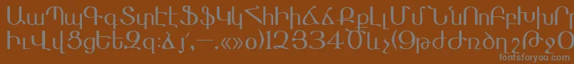 フォントMasis – 茶色の背景に灰色の文字