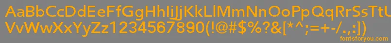 フォントFredericRegular – オレンジの文字は灰色の背景にあります。