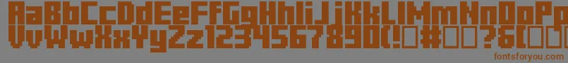 フォントMinercraftory – 茶色の文字が灰色の背景にあります。