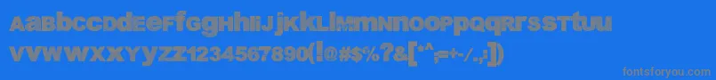 DabreGrunge-fontti – harmaat kirjasimet sinisellä taustalla