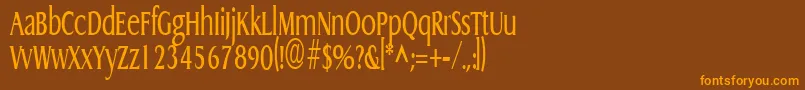 フォントGriffoncondensedRegular – オレンジ色の文字が茶色の背景にあります。