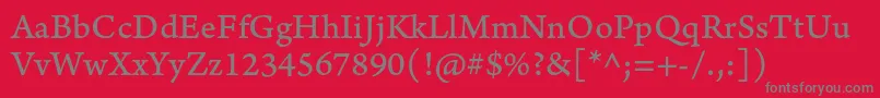 ArnoproCaption-fontti – harmaat kirjasimet punaisella taustalla
