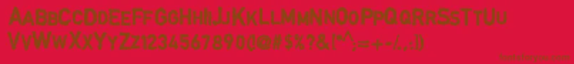 DingarbageschriftBold-Schriftart – Braune Schriften auf rotem Hintergrund
