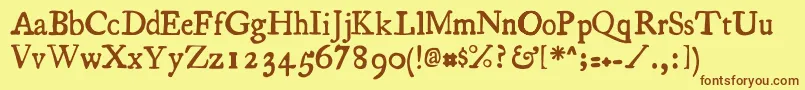 フォントEssays – 茶色の文字が黄色の背景にあります。