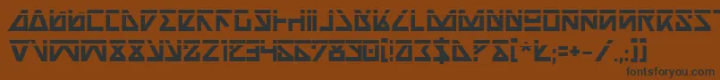 フォントNickbl – 黒い文字が茶色の背景にあります