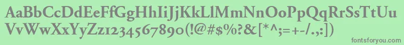 AdobeGaramondBoldOldstyleFigures-fontti – harmaat kirjasimet vihreällä taustalla