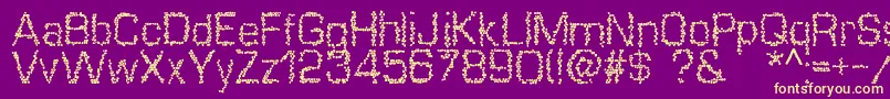 Mosaique Font – Yellow Fonts on Purple Background