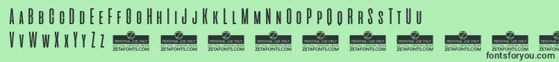 AliensAndCowsTrial Font – Black Fonts on Green Background