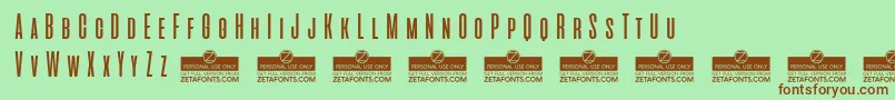 AliensAndCowsTrial Font – Brown Fonts on Green Background