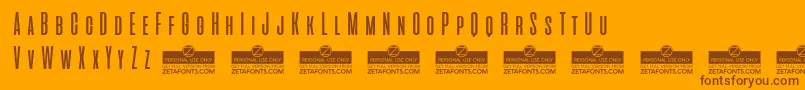 AliensAndCowsTrial Font – Brown Fonts on Orange Background