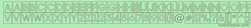 Avante7-fontti – harmaat kirjasimet vihreällä taustalla