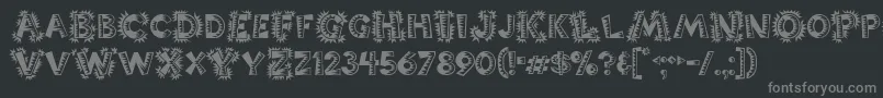 Popticsone-fontti – harmaat kirjasimet mustalla taustalla