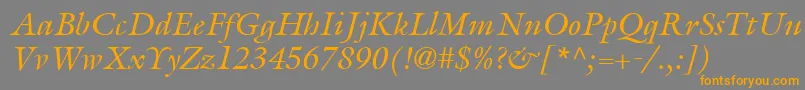 フォントItcGalliardLtItalic – オレンジの文字は灰色の背景にあります。