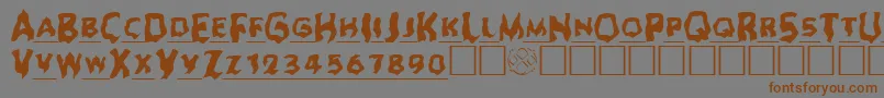 フォントGhoulheadline – 茶色の文字が灰色の背景にあります。