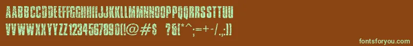 フォントBrokenglass – 緑色の文字が茶色の背景にあります。