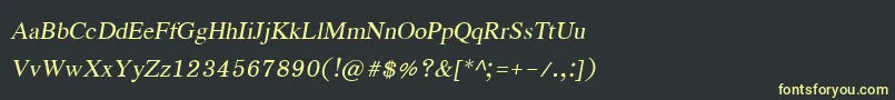 フォントEucrosiaupcItalic – 黒い背景に黄色の文字