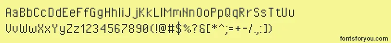 Fonte Pixeloperator – fontes pretas em um fundo amarelo