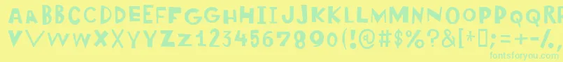 Wonderlism Font – Green Fonts on Yellow Background