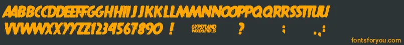 Gypsyland Font – Orange Fonts on Black Background