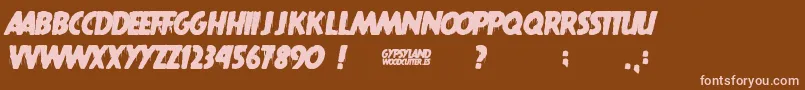 Gypsyland Font – Pink Fonts on Brown Background