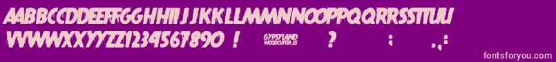 Gypsyland-Schriftart – Rosa Schriften auf violettem Hintergrund