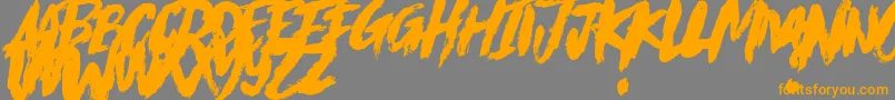 Eclipse ffy-Schriftart – Orangefarbene Schriften auf grauem Hintergrund