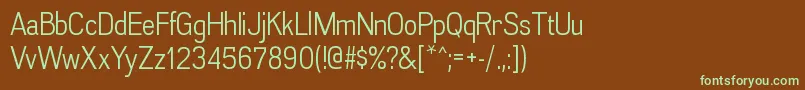 フォントAkazanbkRegular – 緑色の文字が茶色の背景にあります。