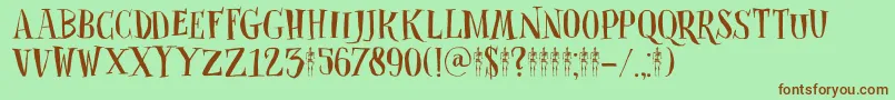 DkClosetSkeleton-Schriftart – Braune Schriften auf grünem Hintergrund