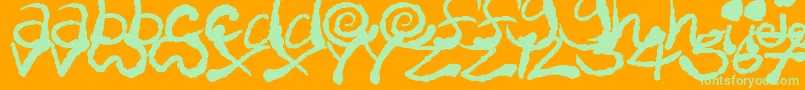 Czcionka InkyScrawls – zielone czcionki na pomarańczowym tle