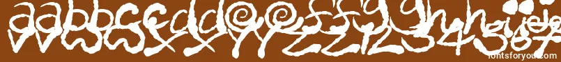 InkyScrawls-Schriftart – Weiße Schriften auf braunem Hintergrund