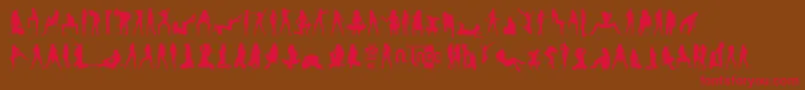 フォントSexySpanishErasmusGirlsV.2.0 – 赤い文字が茶色の背景にあります。