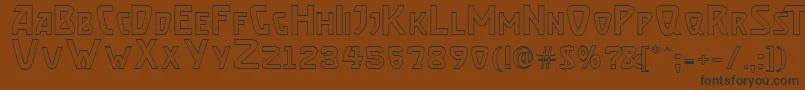 BrassettOutline-Schriftart – Schwarze Schriften auf braunem Hintergrund
