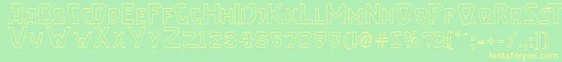 BrassettOutline Font – Yellow Fonts on Green Background